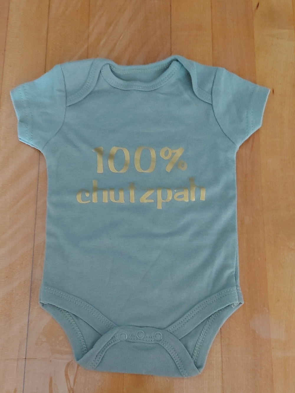 chick pea Sage Green Baby Bodysuit with Gold Text